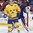 BUFFALO, NEW YORK - JANUARY 4: Sweden's Fabian Zetterlund #28 positions himself in front USA's Joseph Woll #31 during semifinal round action at the 2018 IIHF World Junior Championship. (Photo by Matt Zambonin/HHOF-IIHF Images)

